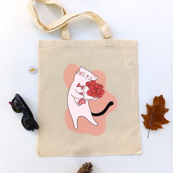 Ceger Buket Ljubavi sa ilustracijom bele mačke koja drži buket crvenih ruža. Idealan poklon za ljubitelje mačaka i sve koji veruju u nežnost i emocije.