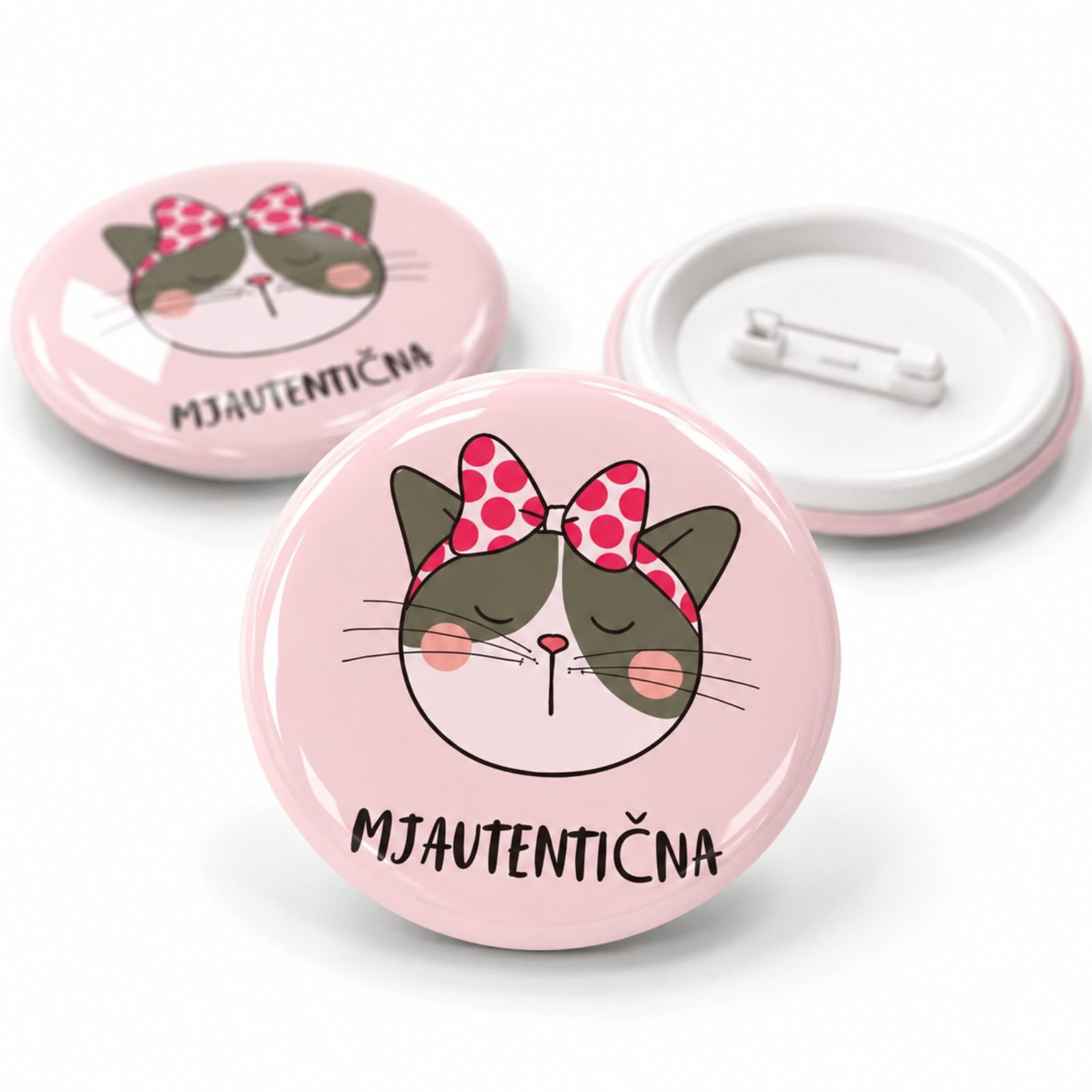 Mjautentična roze bedž sa ilustracijom mačke i mašnom