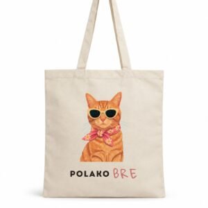 Pamučni ceger sa mačkom Polako Bre na beloj pozadini, sa narandžastom mačkom u naočarima, roze marami i natpisom Polako Bre – macketinashop